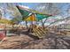 Shaded playground with slides and play structures at 9048 Rich Amethyst Ct, Las Vegas, NV 89149