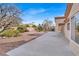 Spacious backyard with large patio and mature trees at 9308 Cactus Wood Dr, Las Vegas, NV 89134