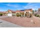 Single-story house with solar panels and desert landscaping at 9308 Cactus Wood Dr, Las Vegas, NV 89134