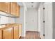 Clean hallway with wood flooring and built-in cabinets at 9308 Cactus Wood Dr, Las Vegas, NV 89134