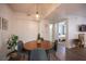 Bright dining area with mid-century modern table and chairs at 950 Seven Hills Dr # 2017, Henderson, NV 89052