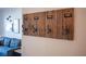 Entryway with rustic wooden coat rack with hooks at 950 Seven Hills Dr # 2017, Henderson, NV 89052