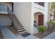 Exterior view showing stairs and a red door at 950 Seven Hills Dr # 2017, Henderson, NV 89052