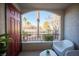 Covered patio with seating and views of the complex at 950 Seven Hills Dr # 2017, Henderson, NV 89052