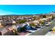 Aerial view of homes and community with mountain views at 9921 Heyfield Dr, Las Vegas, NV 89134