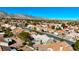 Aerial view of homes and community with mountain views at 9921 Heyfield Dr, Las Vegas, NV 89134