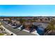 Aerial view of houses in a residential neighborhood with mountain views at 9921 Heyfield Dr, Las Vegas, NV 89134