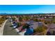 Aerial view of homes and community with mountain views at 9921 Heyfield Dr, Las Vegas, NV 89134