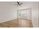 Bright bedroom with bay window and ceiling fan at 9921 Heyfield Dr, Las Vegas, NV 89134