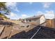 Backyard view showcasing firepit, landscaping, and home at 10229 Angels Loft St, Las Vegas, NV 89131