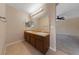 Double vanity bathroom with modern lighting and spacious counters at 10229 Angels Loft St, Las Vegas, NV 89131