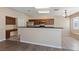 Kitchen boasts granite countertops, ample cabinetry, and stainless steel appliances at 10229 Angels Loft St, Las Vegas, NV 89131