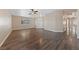 Spacious living room with hardwood floors and ceiling fan at 10229 Angels Loft St, Las Vegas, NV 89131