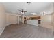 Open concept living and kitchen area with hardwood floors at 10229 Angels Loft St, Las Vegas, NV 89131