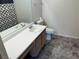 Bathroom features vanity, toilet and tiled floors at 1533 Linnbaker Ln # 201, Las Vegas, NV 89110