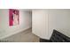 Spacious bedroom with large artwork and seating at 200 Hoover Ave # 1101, Las Vegas, NV 89101