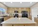 Kitchen island with granite countertop and seating for two at 2314 Rock Slide Cir, Las Vegas, NV 89115