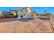 House backyard with gravel and a wooden fence at 2436 Millcroft Dr, Henderson, NV 89074