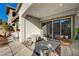 Covered patio with sliding glass doors and storage at 251 Castellari Dr, Las Vegas, NV 89138