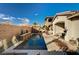 Relaxing backyard pool with mountain views and a spacious patio area at 251 Castellari Dr, Las Vegas, NV 89138