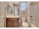 Clean bathroom with single vanity, toilet, and bathtub at 251 Castellari Dr, Las Vegas, NV 89138