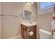 Bathroom with vanity, toilet and mirror at 251 Castellari Dr, Las Vegas, NV 89138