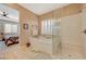 Spa-like bathroom with soaking tub and a separate walk-in shower at 251 Castellari Dr, Las Vegas, NV 89138