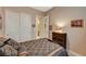 Bedroom with double bed and access to bathroom at 251 Castellari Dr, Las Vegas, NV 89138