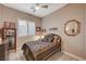 Cozy bedroom with a double bed and decorative accents at 251 Castellari Dr, Las Vegas, NV 89138