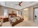 Spacious Primary bedroom with a large bed and ensuite bathroom access at 251 Castellari Dr, Las Vegas, NV 89138