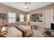 Cozy bedroom with a double bed and built-in desk area at 251 Castellari Dr, Las Vegas, NV 89138