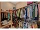 Large walk-in closet with ample hanging space and shelving at 251 Castellari Dr, Las Vegas, NV 89138