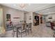 Bright dining area with seating for six, adjacent to kitchen and Gathering room at 251 Castellari Dr, Las Vegas, NV 89138