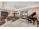 Open concept living room with hardwood floors and comfortable seating at 251 Castellari Dr, Las Vegas, NV 89138