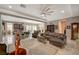 Open floor plan with living room, kitchen, and access to backyard at 251 Castellari Dr, Las Vegas, NV 89138