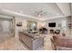 Bright and airy living room with a piano and access to backyard patio at 251 Castellari Dr, Las Vegas, NV 89138