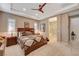 Main bedroom with king bed and ensuite bathroom at 251 Castellari Dr, Las Vegas, NV 89138