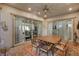 Covered patio with dining area and sliding glass doors to the home at 251 Castellari Dr, Las Vegas, NV 89138