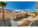 Water feature and tiled pool area at 251 Castellari Dr, Las Vegas, NV 89138