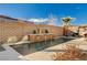 Water feature and tiled pool area at 251 Castellari Dr, Las Vegas, NV 89138