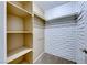 Large closet with built-in shelving at 3024 Saint George St # H, North Las Vegas, NV 89030