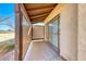 Covered patio with tile flooring and sliding glass door access at 3024 Saint George St # H, North Las Vegas, NV 89030