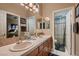 Bathroom with double sinks and shower/tub combo at 3042 Hammerwood Dr, Las Vegas, NV 89135