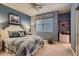 Comfortable bedroom with ceiling fan and window blinds at 3042 Hammerwood Dr, Las Vegas, NV 89135