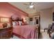 Elegant bedroom with a wooden bed frame and a view of another room at 3042 Hammerwood Dr, Las Vegas, NV 89135