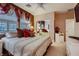 Spacious bedroom with a comfortable bed and plenty of natural light at 3042 Hammerwood Dr, Las Vegas, NV 89135