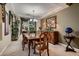 Elegant dining room with hardwood table and chairs at 3042 Hammerwood Dr, Las Vegas, NV 89135