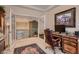 Home office features built-in desk, and view of upper level at 3042 Hammerwood Dr, Las Vegas, NV 89135