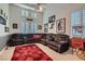 Spacious home theater with large sectional sofa and popcorn machine at 3042 Hammerwood Dr, Las Vegas, NV 89135