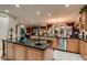 Island kitchen with granite countertops and custom cabinetry at 3042 Hammerwood Dr, Las Vegas, NV 89135
